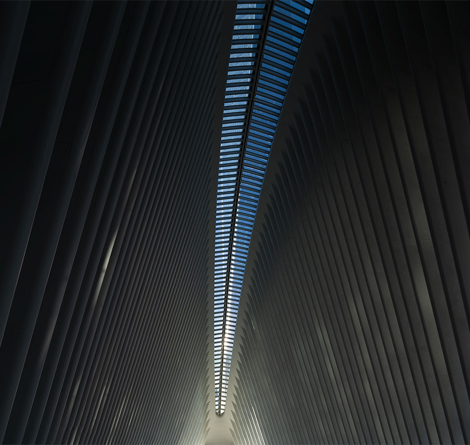 Interior of the Oculus at World Trade Center in New York City, showing the dramatic architectural lines of the main hall